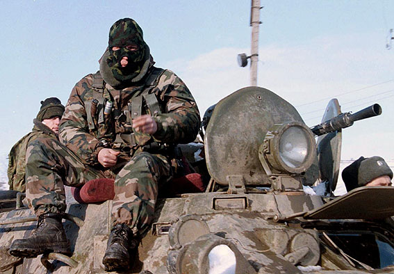guys riding russian tank modern