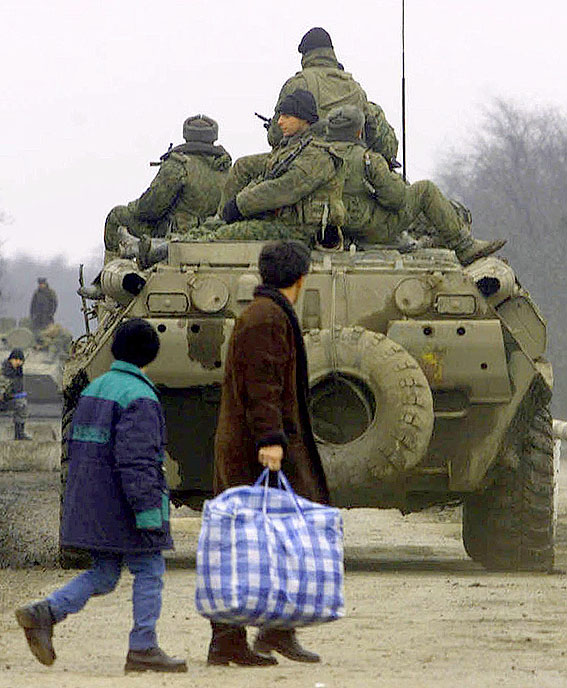 guys riding russian tank modern